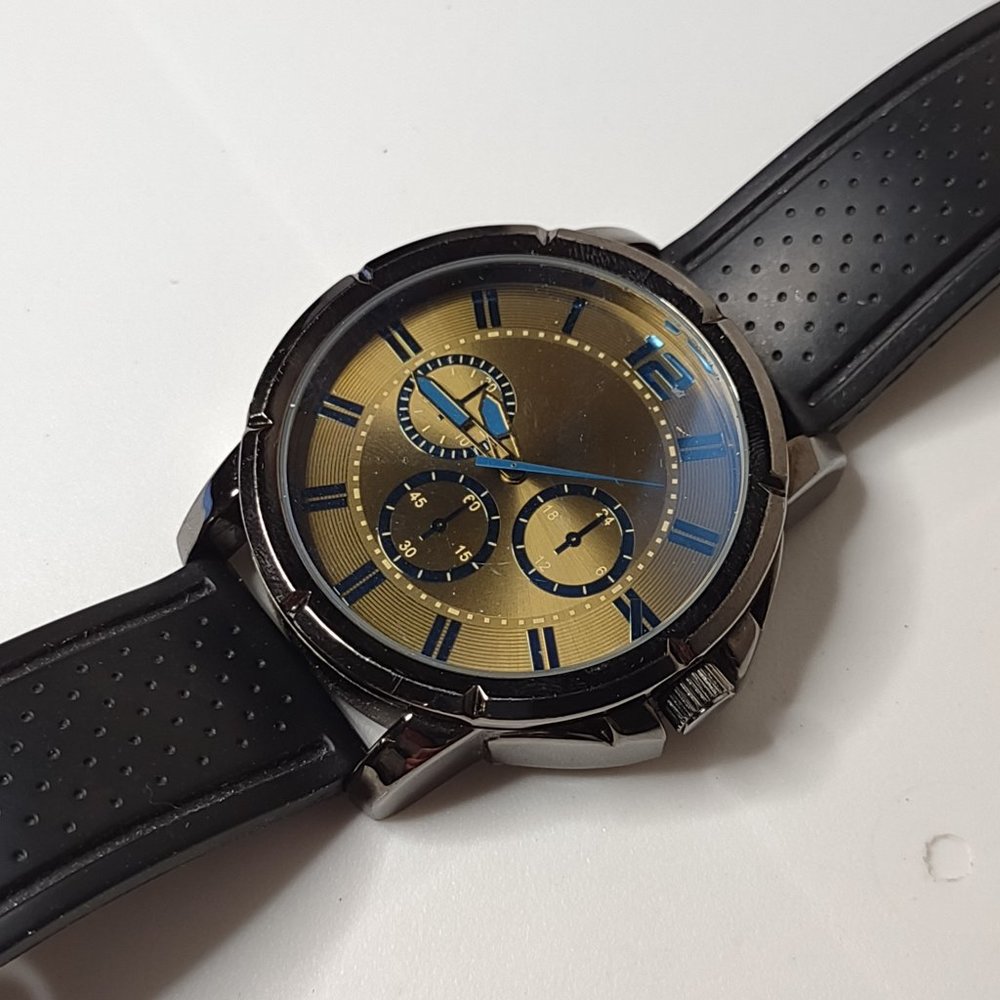 Large Watch With Black Rubber Band